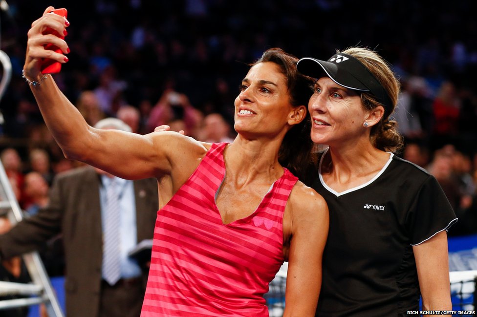 Tennis players Gabriela Sabatini of Argentina and Monica Seles of the United States pose for a selfie